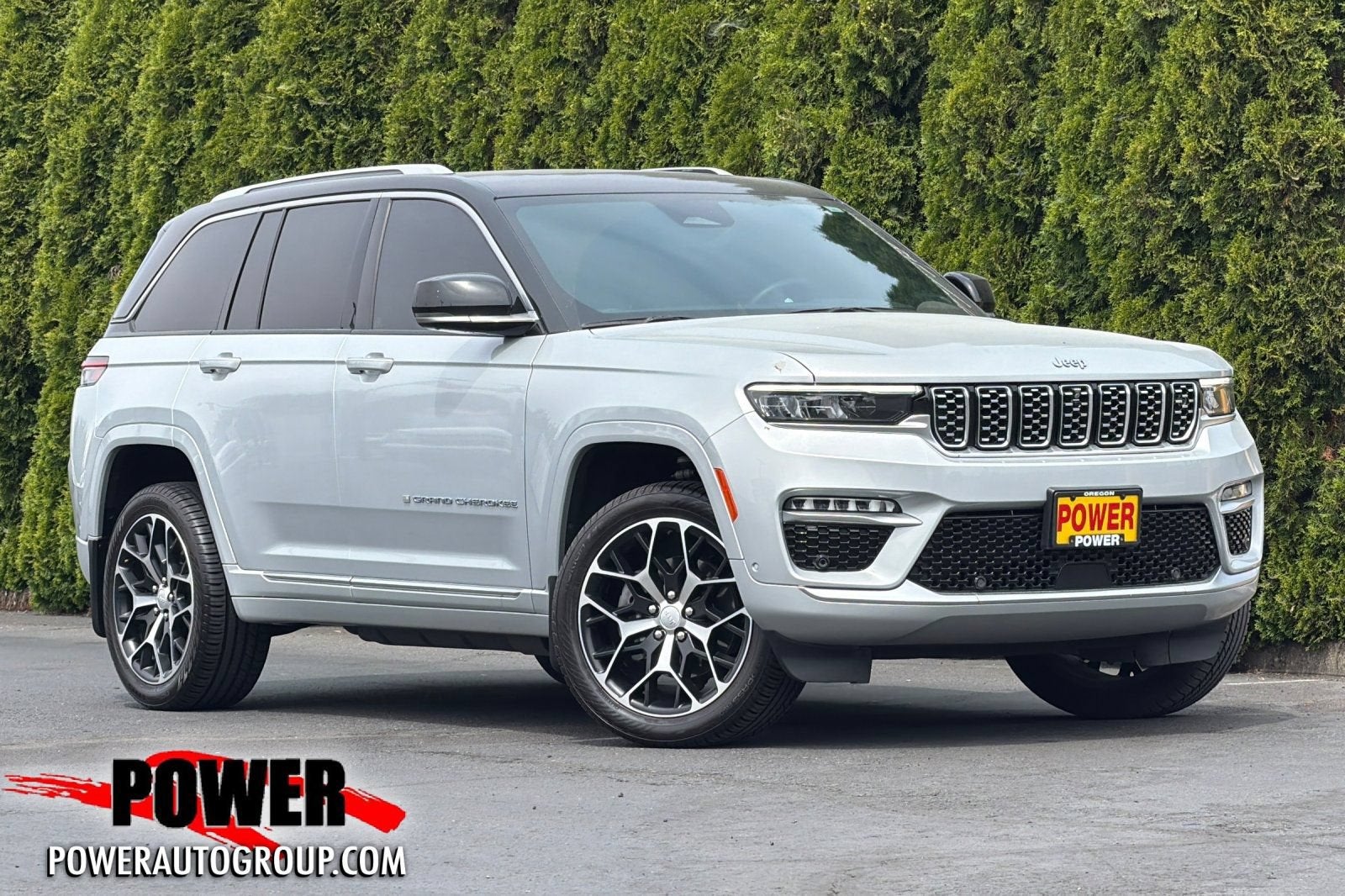 2022 Jeep Grand Cherokee 4xe Summit Reserve in Silver — front three-quarter view