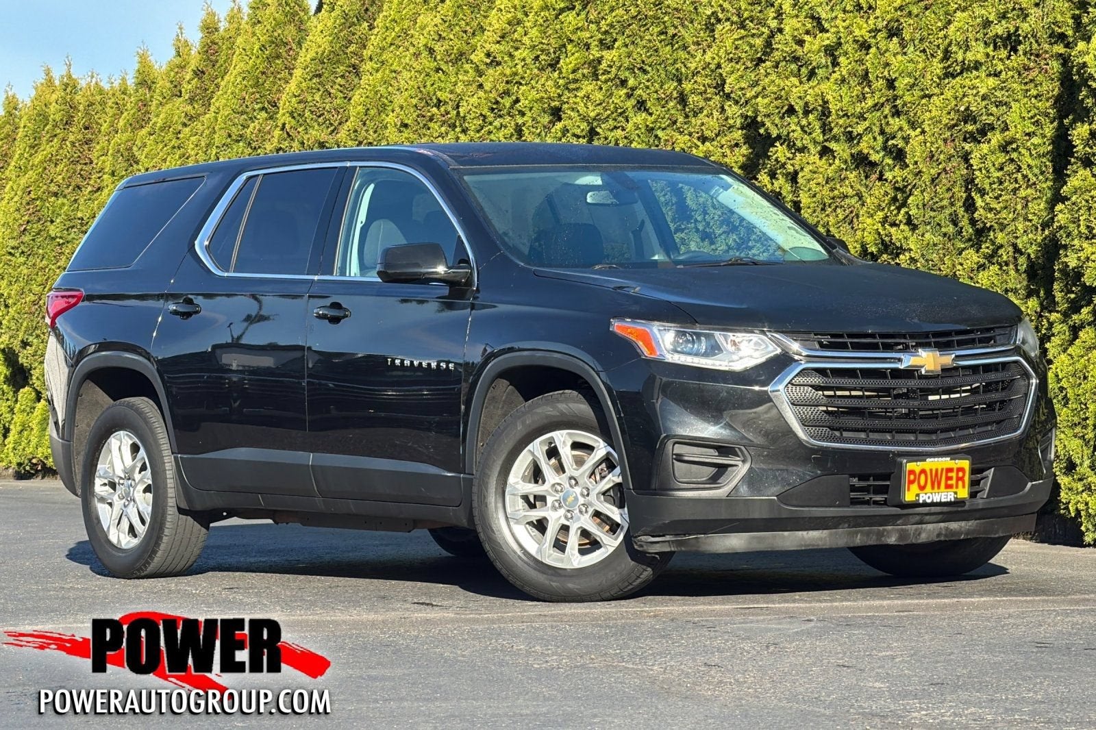 2018 Chevrolet Traverse LS in Mosaic Black Metallic — front three-quarter view