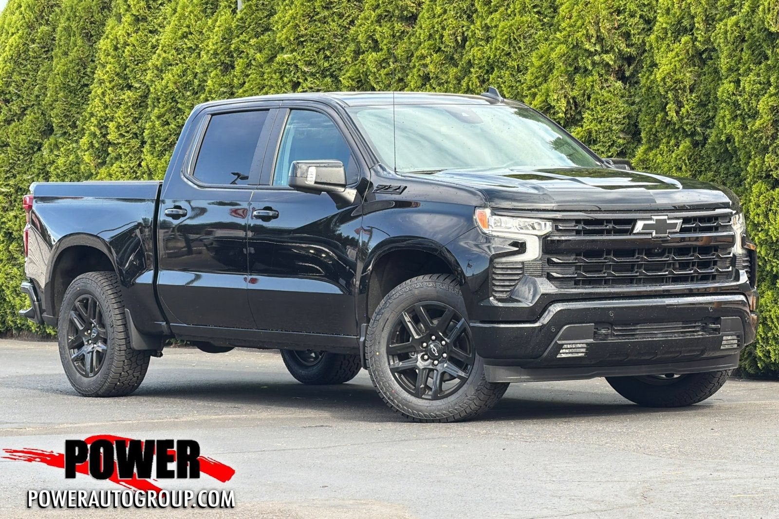 2025 Chevrolet Silverado 1500 RST in Black — front three-quarter view
