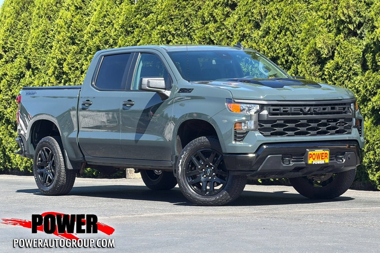 2025 Chevrolet Silverado 1500 Custom Trail Boss in Cypress Gray — front three-quarter view
