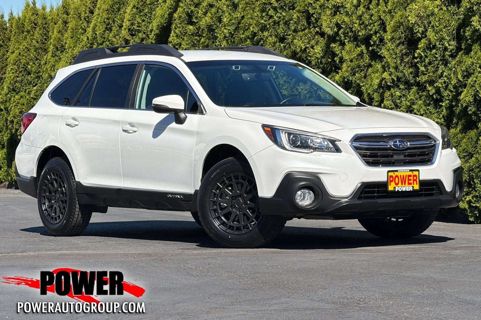 2019 Subaru Outback Premium in White — front three-quarter view