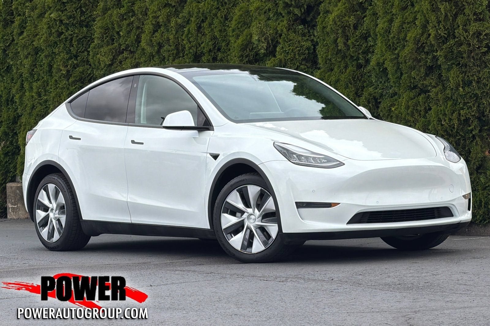 2021 Tesla Model Y Long Range in White — front three-quarter view