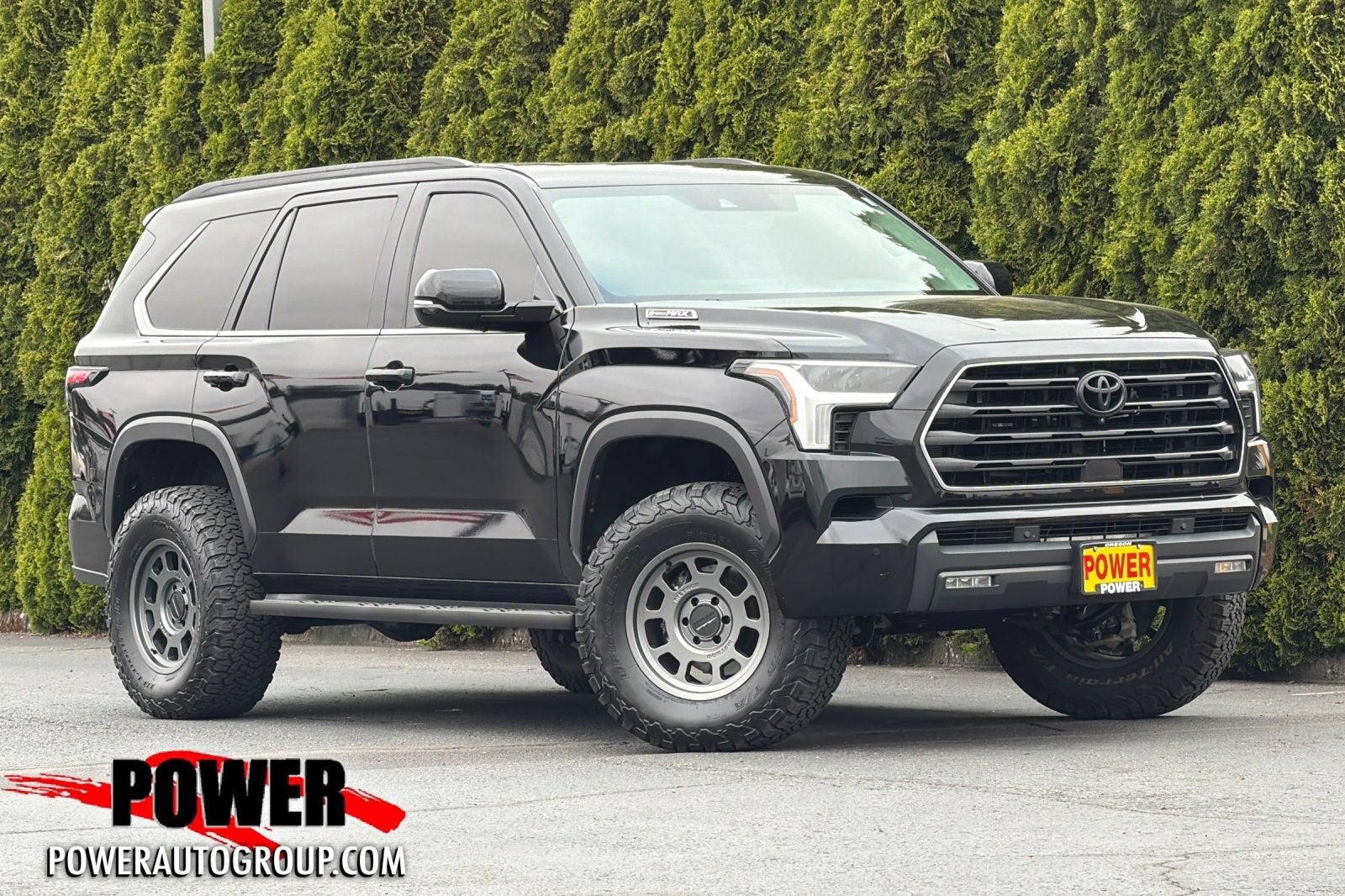 2024 Toyota Sequoia SR5 in Midnight Black — front three-quarter view