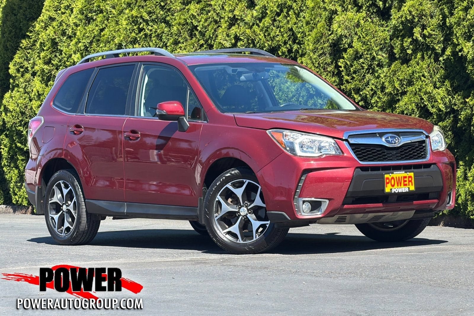 2014 Subaru Forester 2.0XT Touring in Red — front three-quarter view
