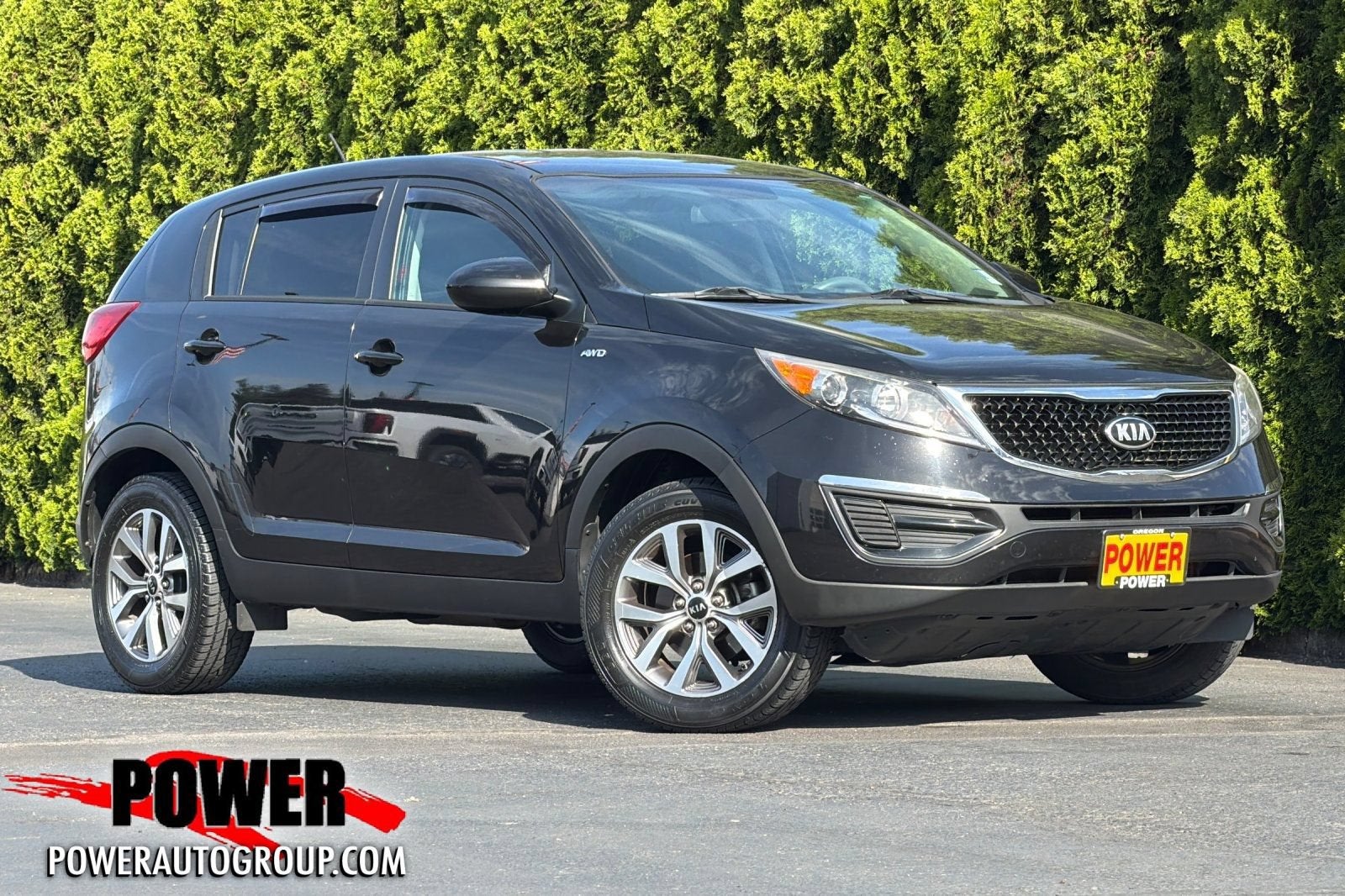 2014 Kia Sportage LX in Black — front three-quarter view