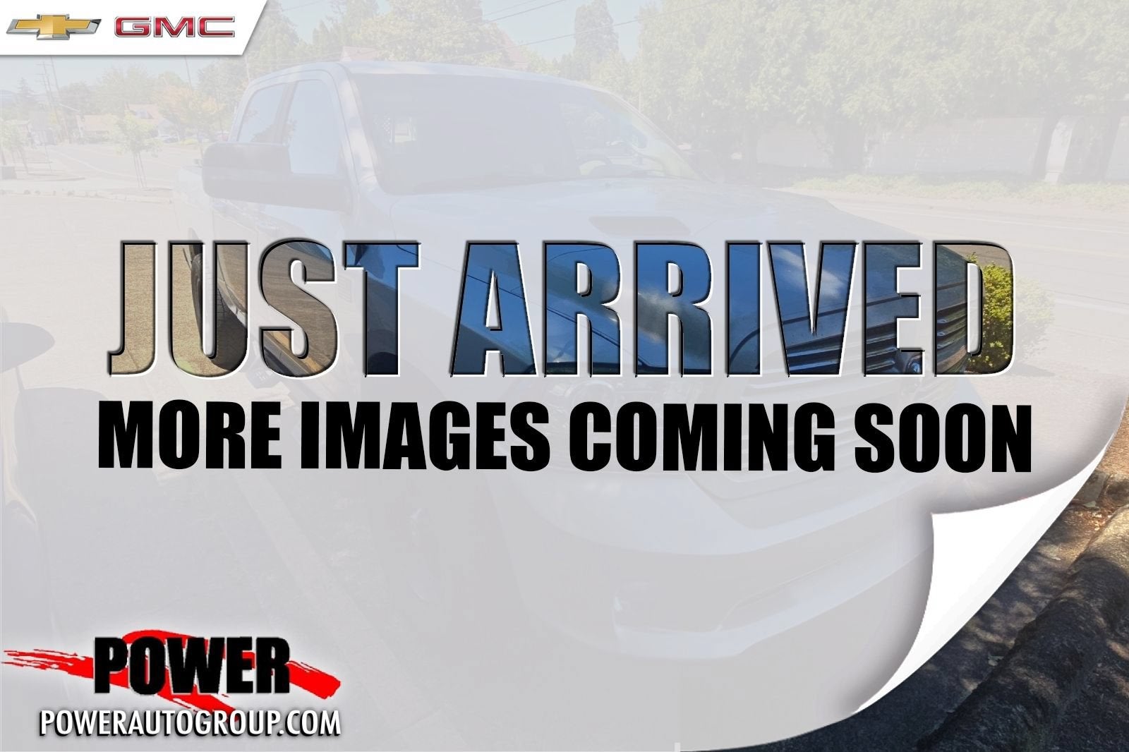2013 RAM 1500 Sport in Bright Silver Metallic Clearcoat — front three-quarter view
