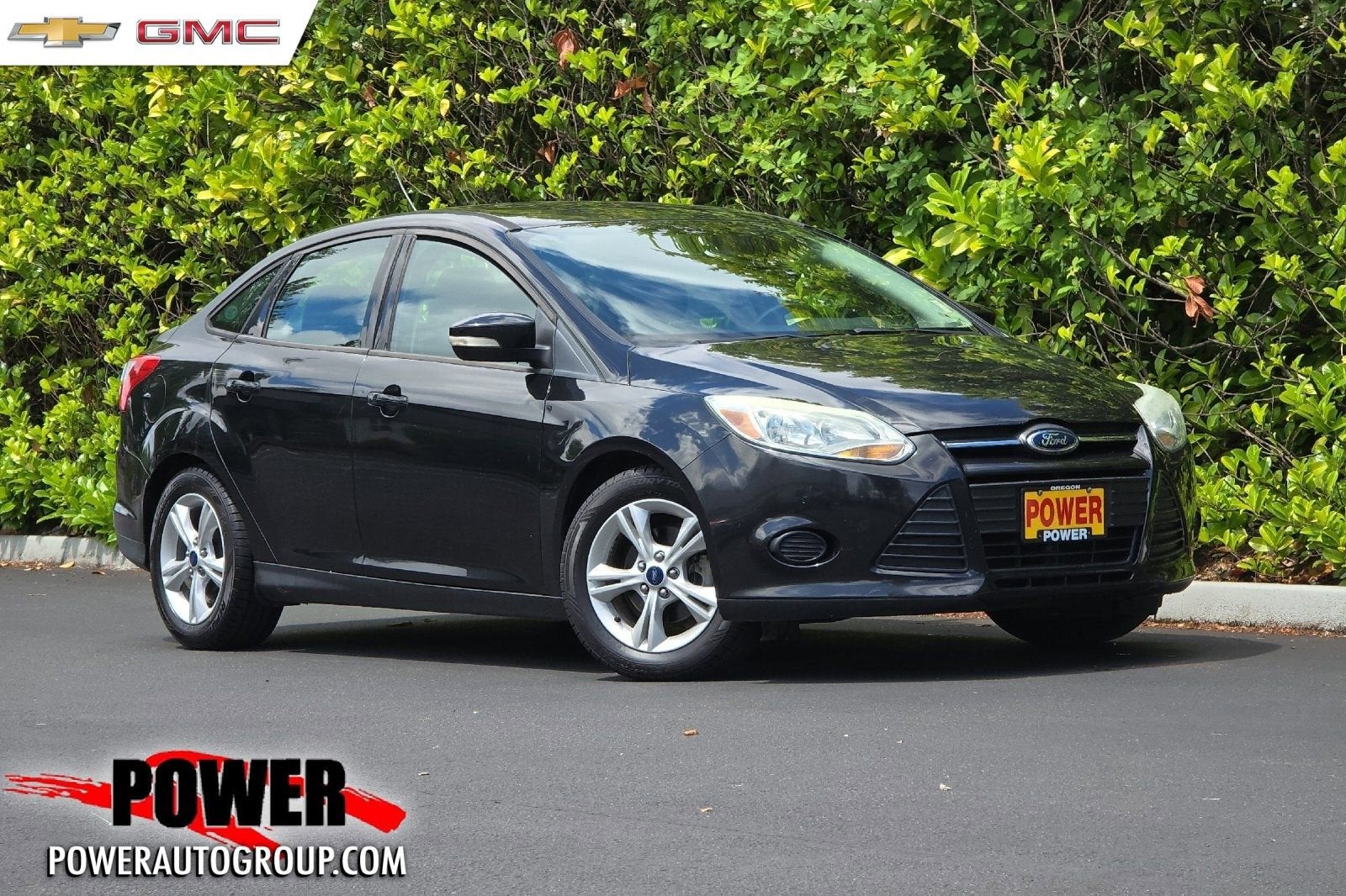 2014 Ford Focus SE in Tuxedo Black Me — front three-quarter view
