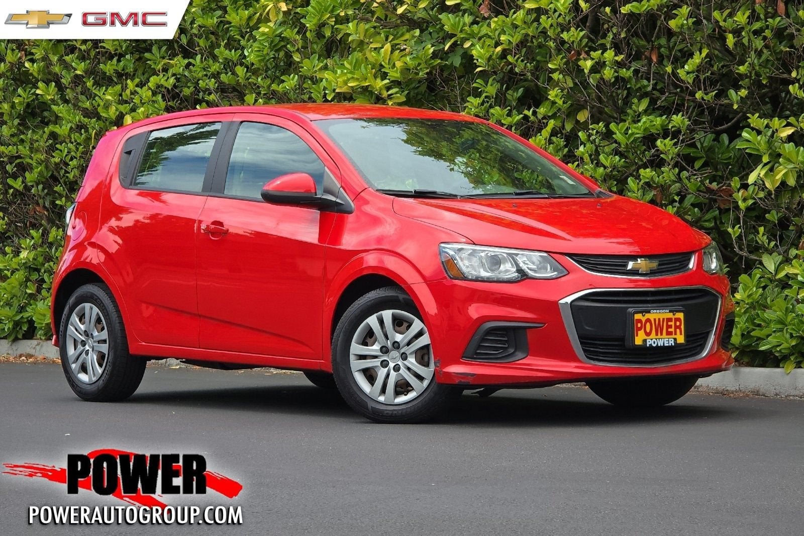 2020 Chevrolet Sonic LT in Red Hot — front three-quarter view