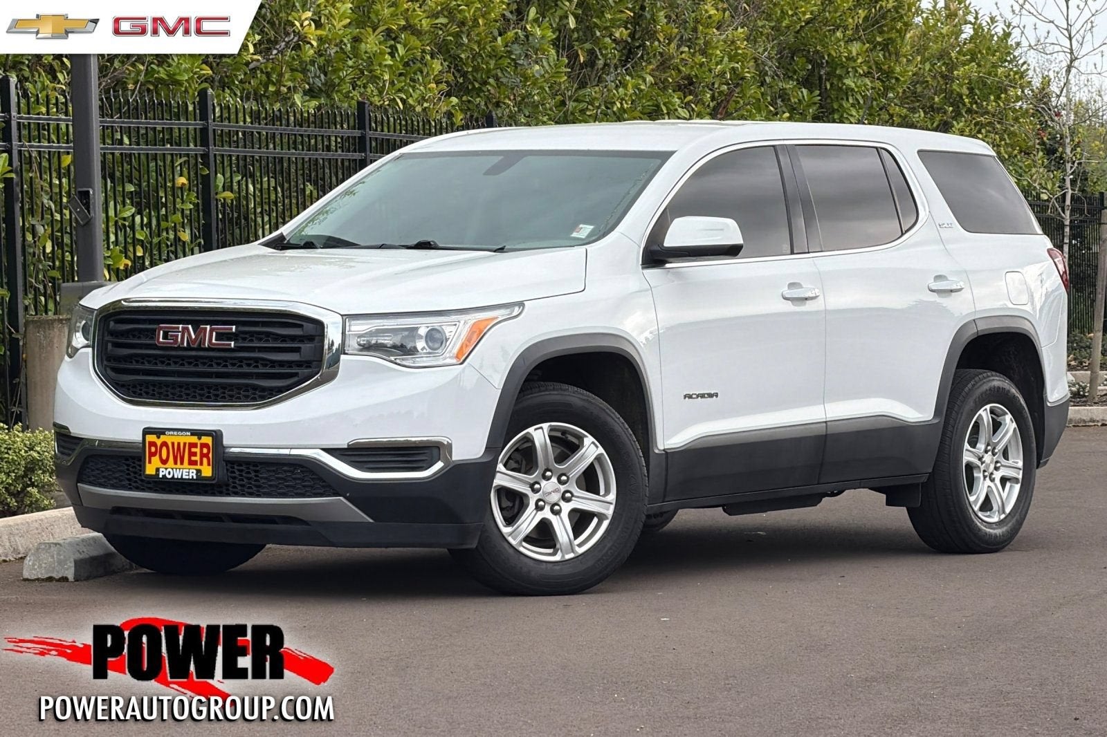 2019 GMC Acadia SLE in Summit White — front three-quarter view
