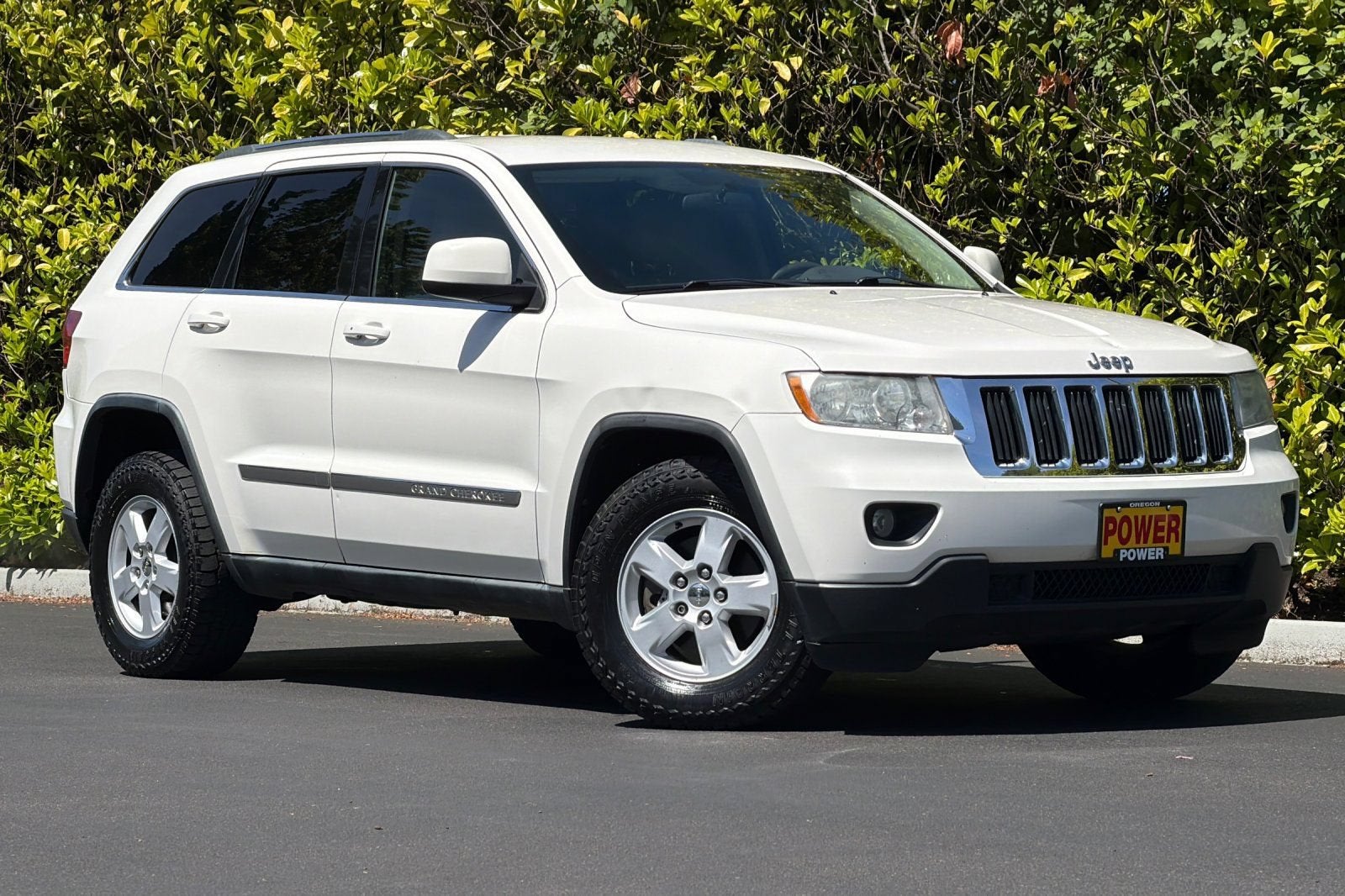 2011 Jeep Grand Cherokee — side profile view