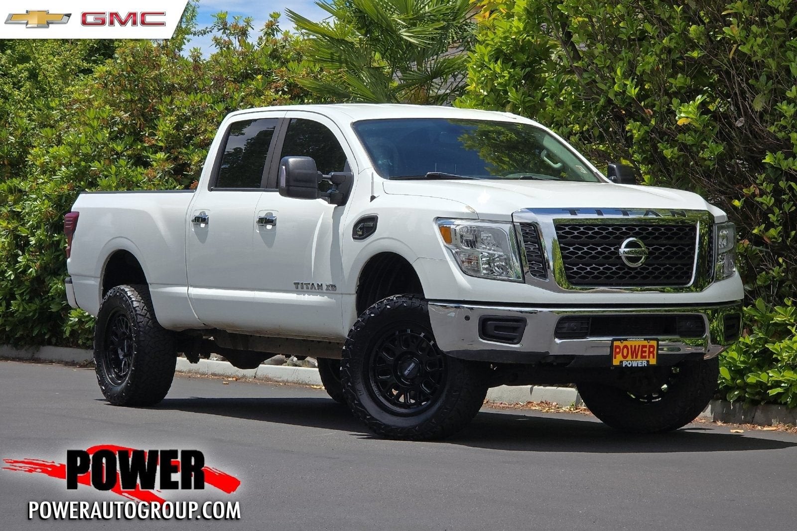 2018 Nissan Titan XD SV in Glacier White — front three-quarter view