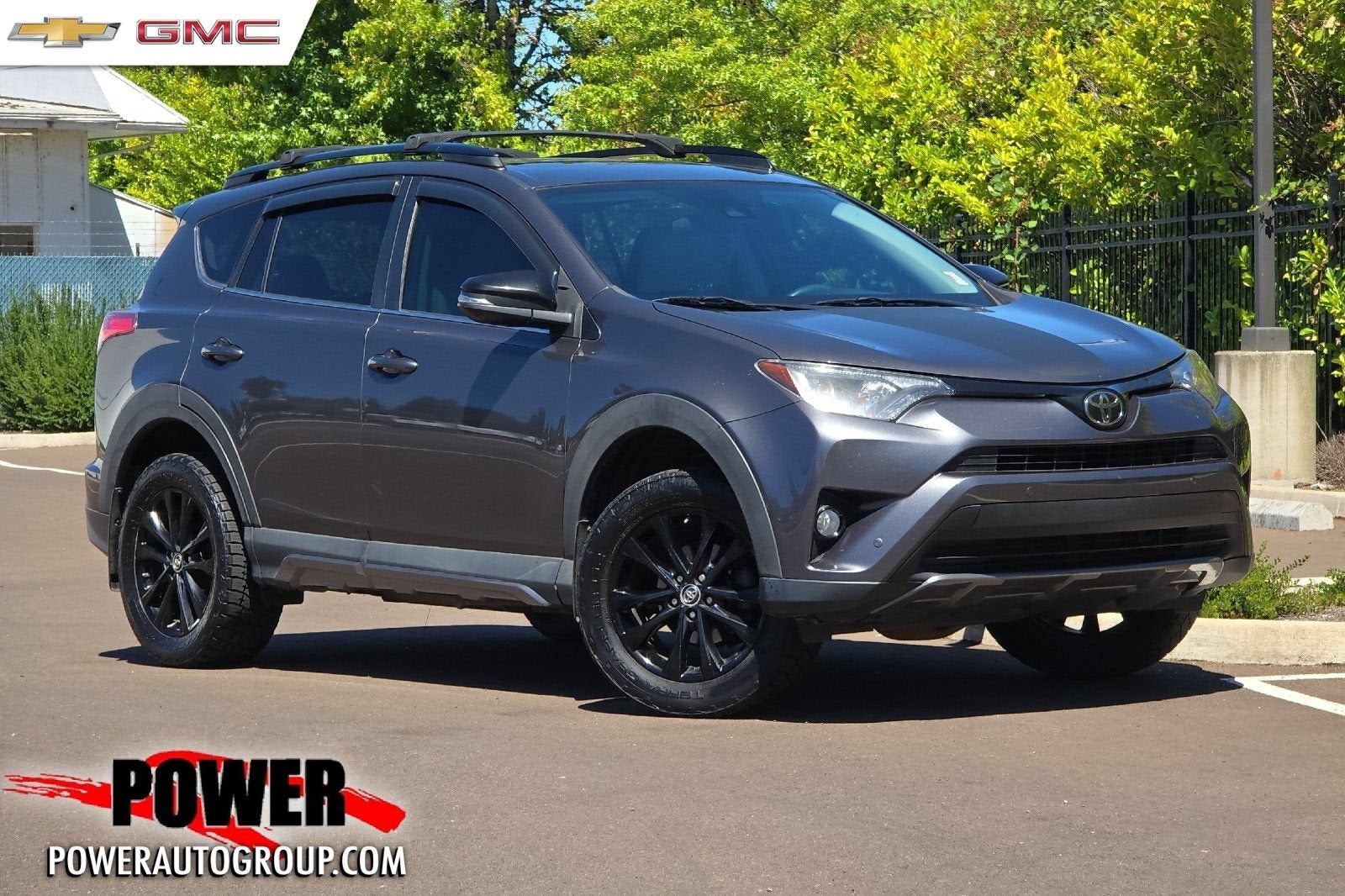 2018 Toyota RAV4 XLE in Magnetic Gray Metallic — front three-quarter view