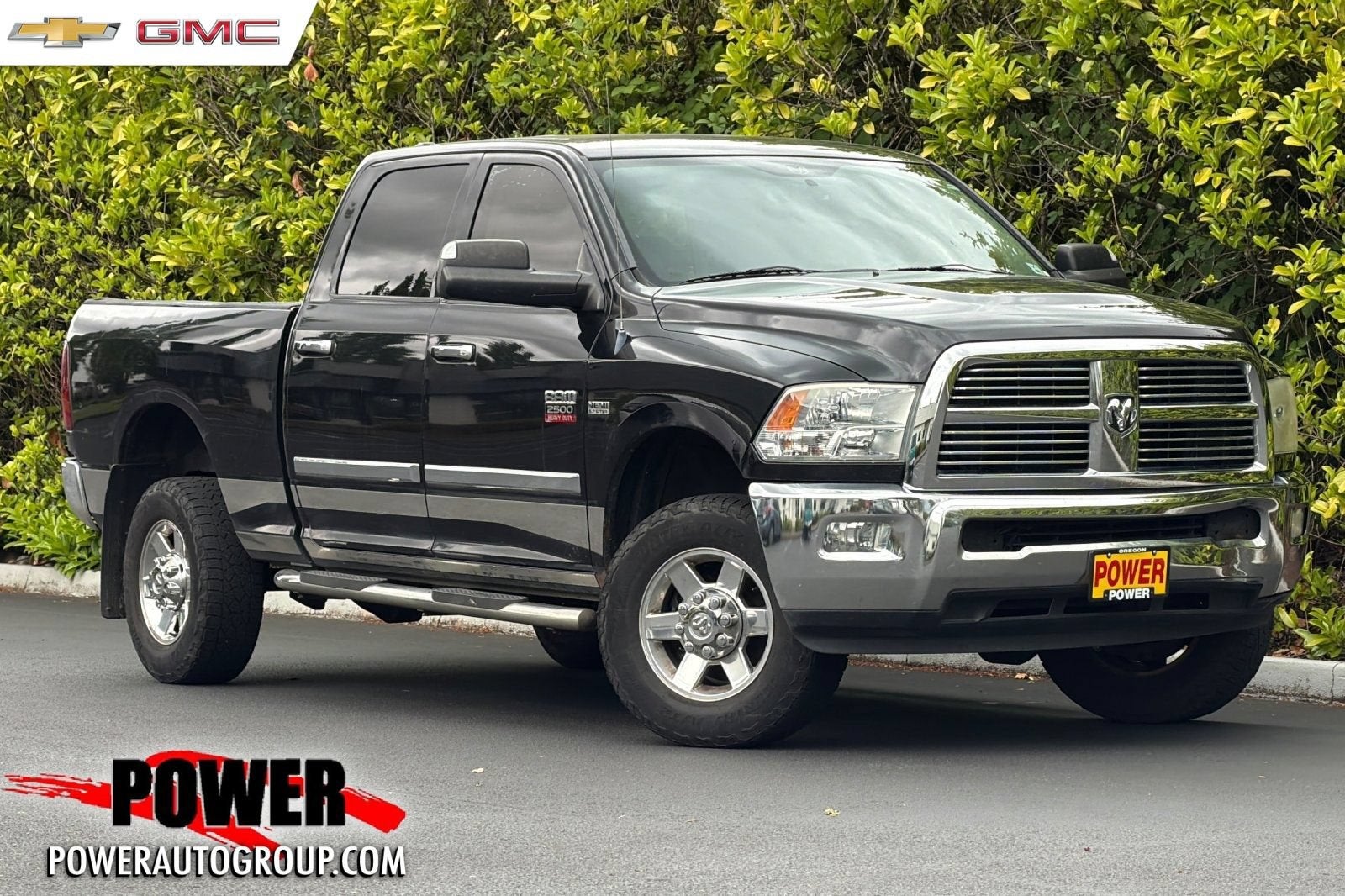 2010 Dodge Ram 2500 SLT in Brilliant Black — front three-quarter view