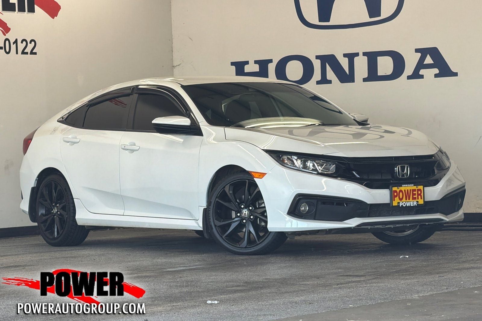 2020 Honda Civic Sport in White — front three-quarter view