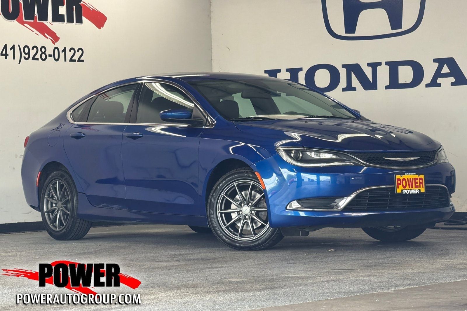 2016 Chrysler 200 Limited in Vivid Blue — front three-quarter view