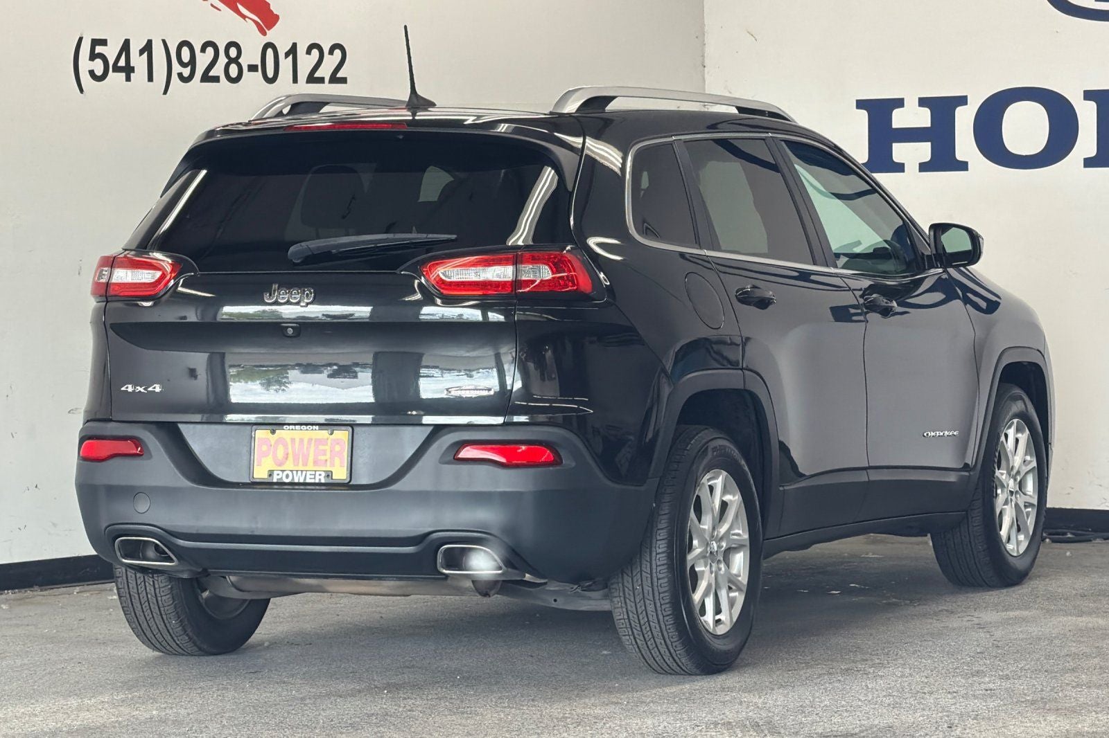 2016 Jeep Cherokee — rear three-quarter view