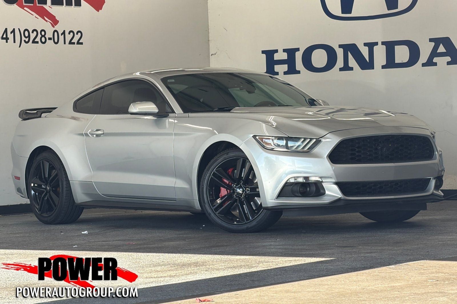 2016 Ford Mustang EcoBoost in Ingot Silver — front three-quarter view