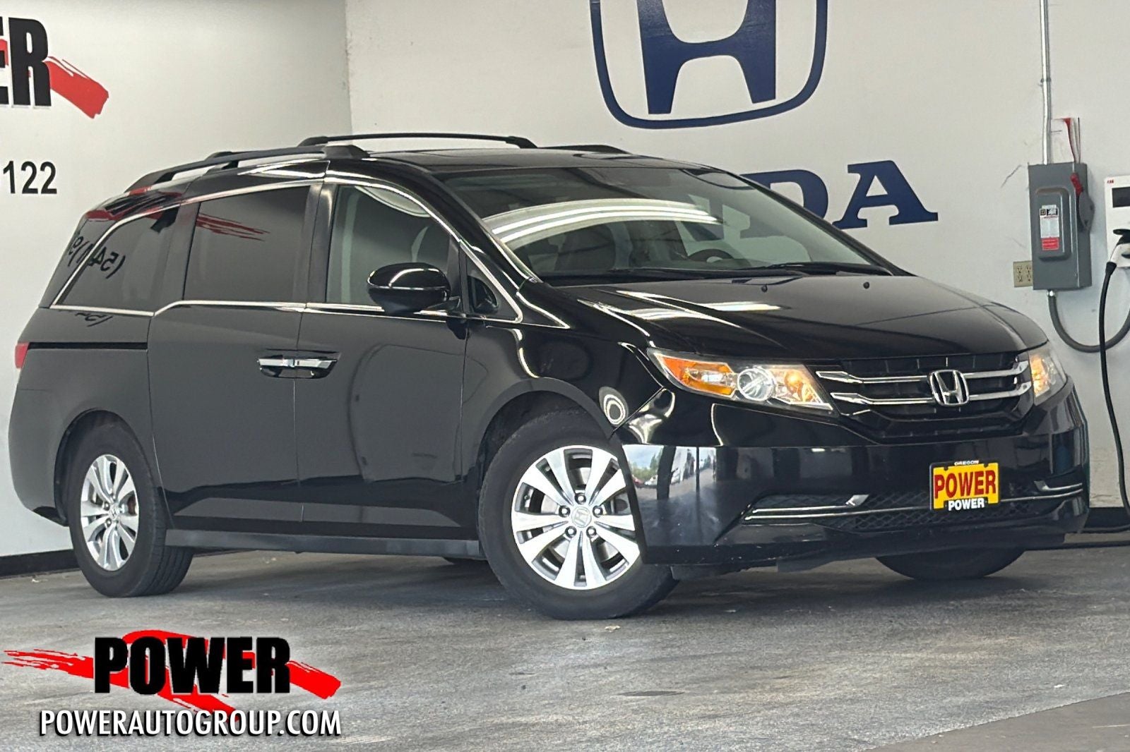 2015 Honda Odyssey EX-L in Black — front three-quarter view