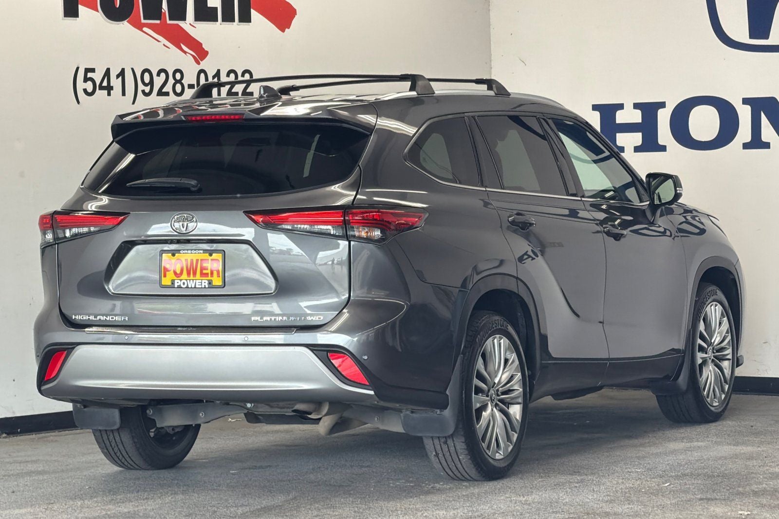 2023 Toyota Highlander — rear three-quarter view