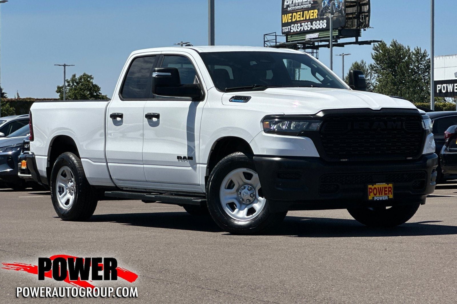 2025 RAM 1500 Tradesman in Bright White Clearcoat — front three-quarter view