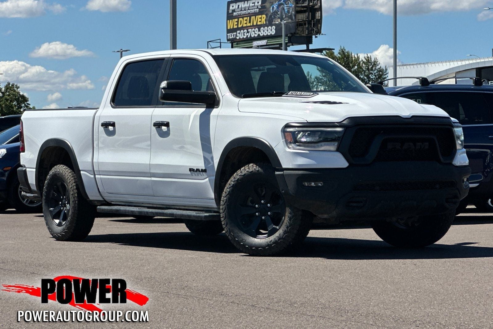 2023 RAM 1500 Rebel in Other — front three-quarter view