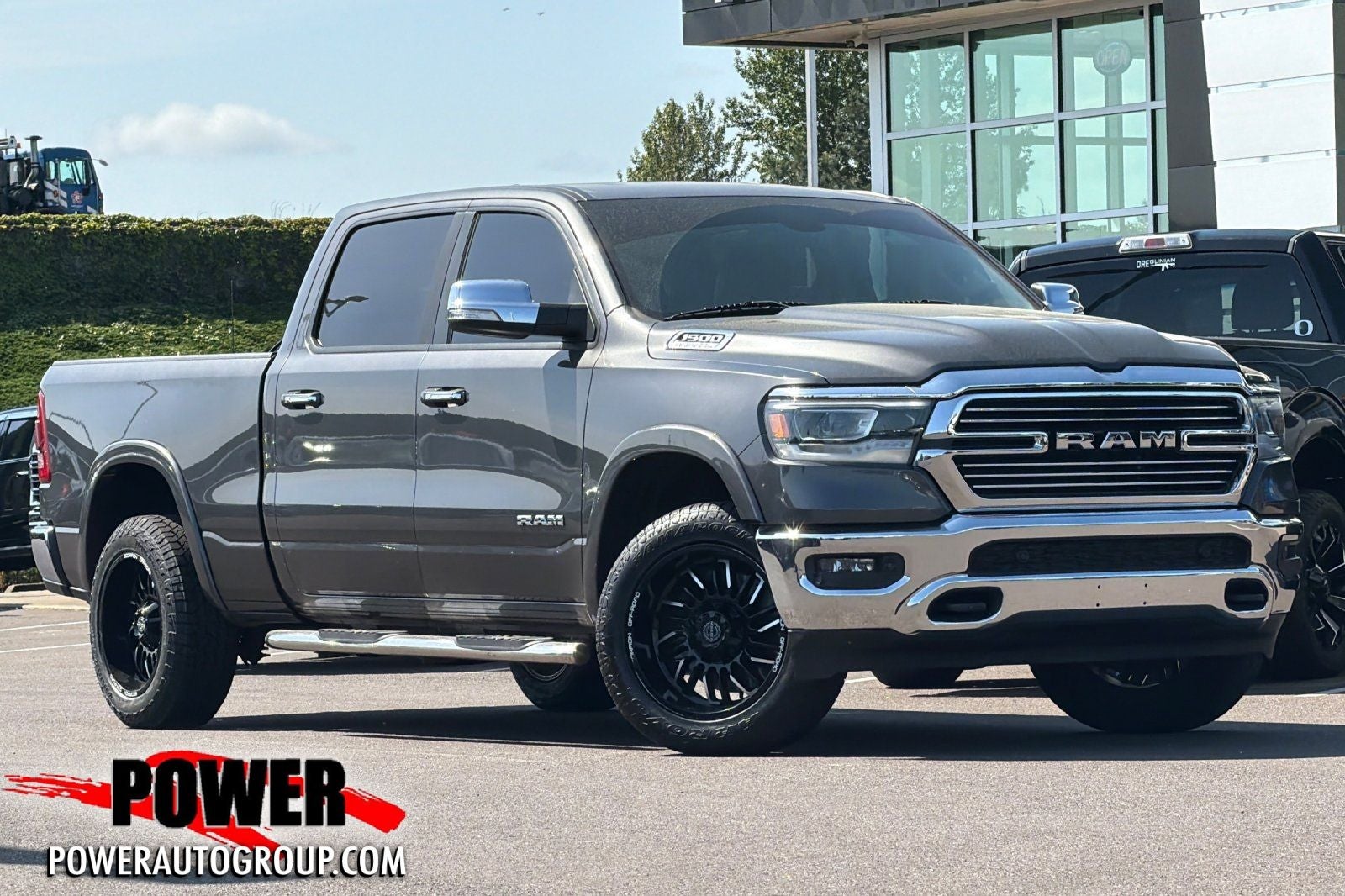 2020 RAM 1500 Laramie in Granite Crystal Metallic Clearcoat — front three-quarter view