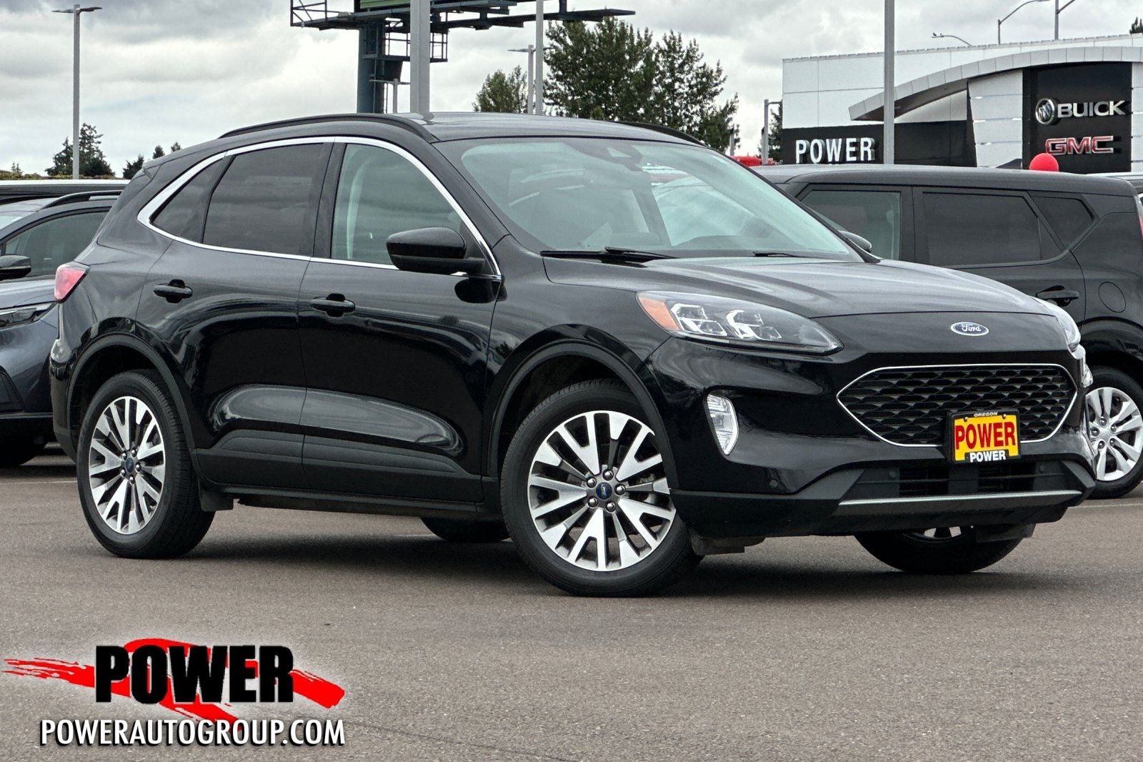2022 Ford Escape Titanium in Agate Black Metallic — front three-quarter view
