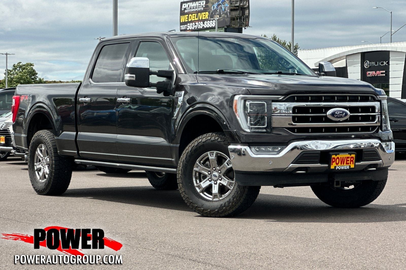 2021 Ford F-150 Lariat in Kodiak Brown Metallic — front three-quarter view