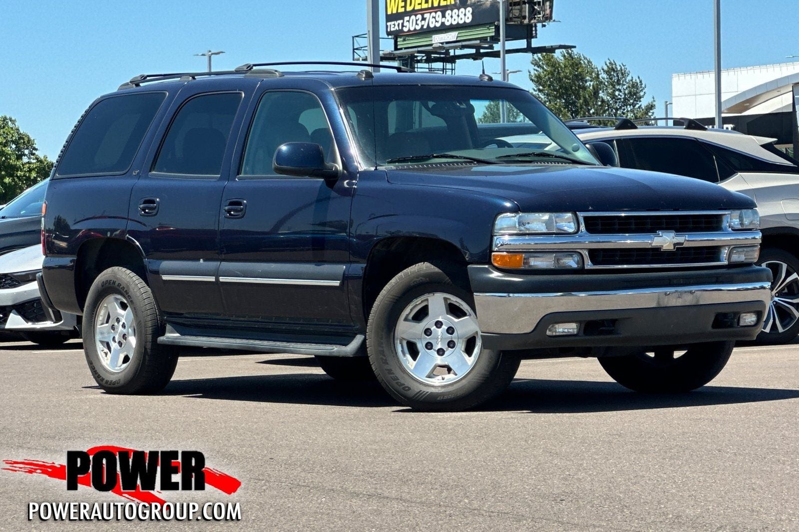 2004 Chevrolet Tahoe LT in Medium Cadet Blue Metallic — front three-quarter view