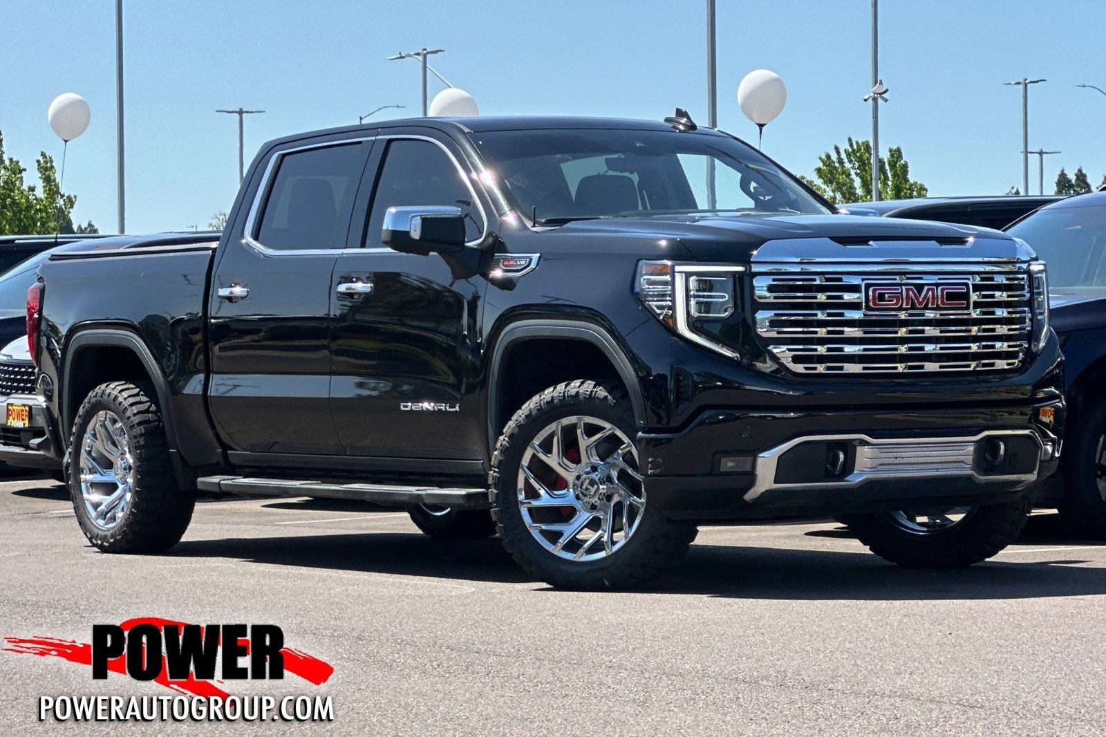 2022 GMC Sierra 1500 Denali in Onyx Black — front three-quarter view