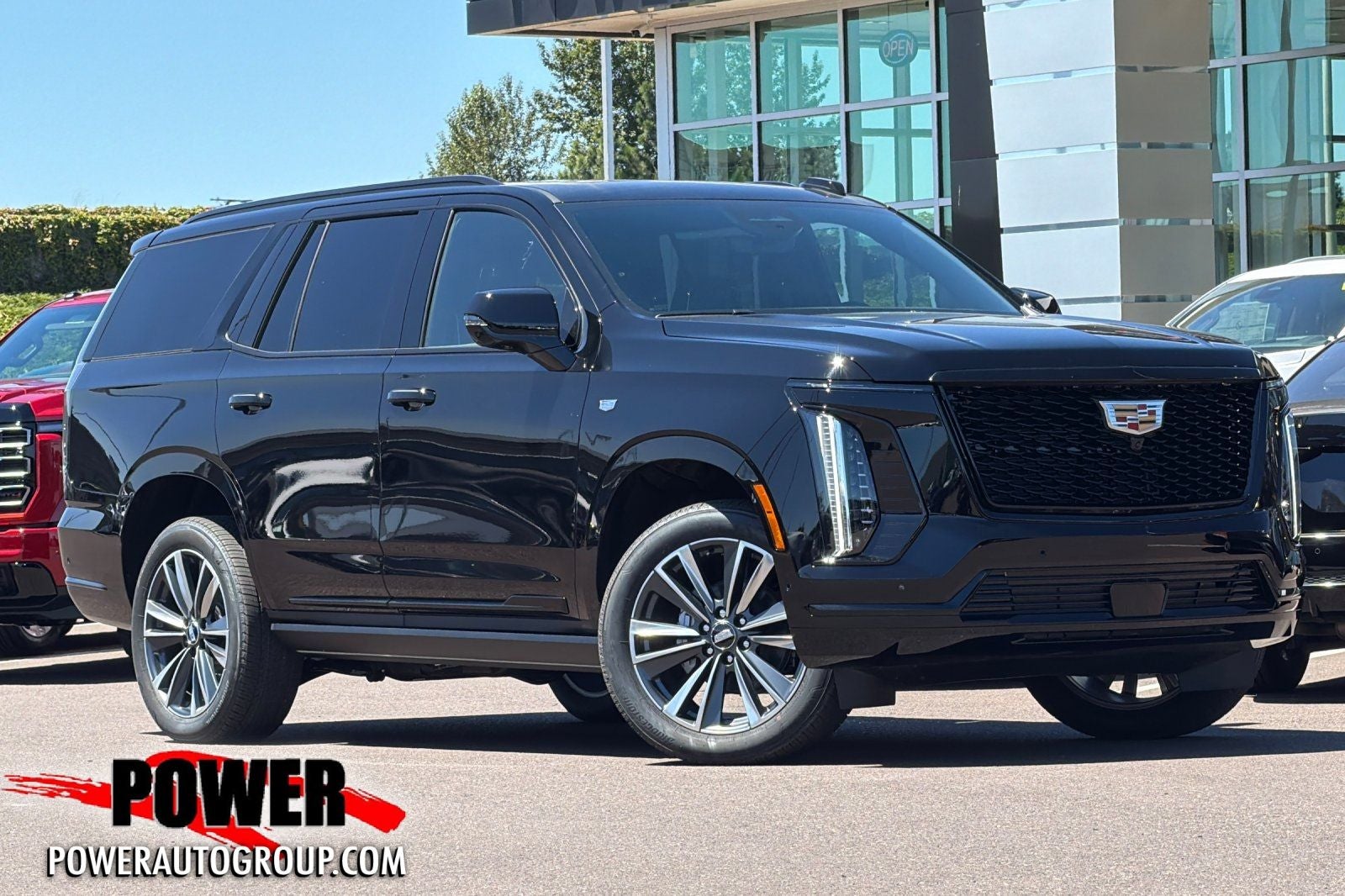 2026 Cadillac Escalade Sport in Black — front three-quarter view
