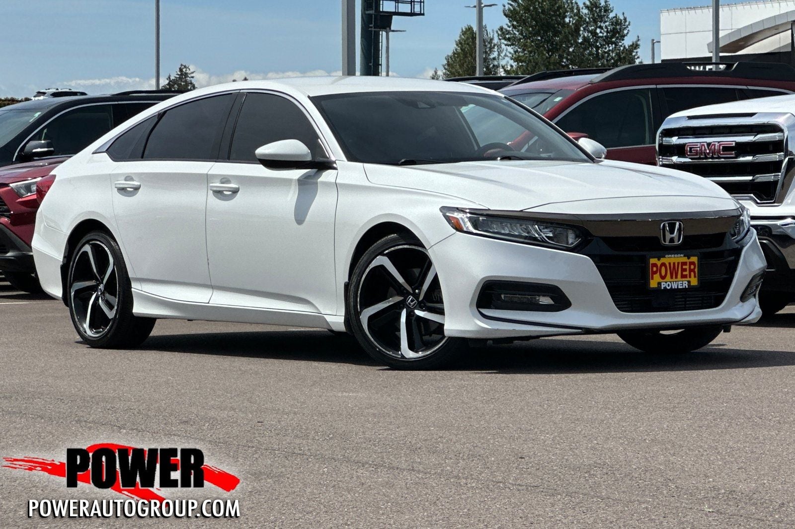 2019 Honda Accord Sport in Platinum White Pearl — front three-quarter view