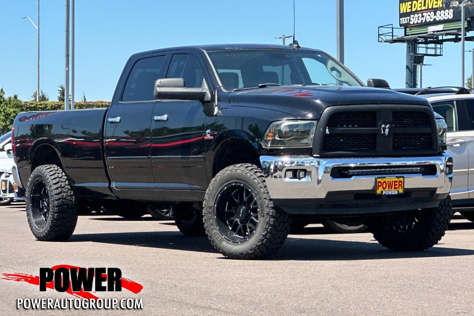 2014 RAM 3500 Laramie in Black Clearcoat — front three-quarter view