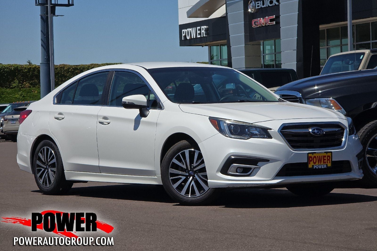 2019 Subaru Legacy 2.5i Premium in Crystal White Pearl — front three-quarter view