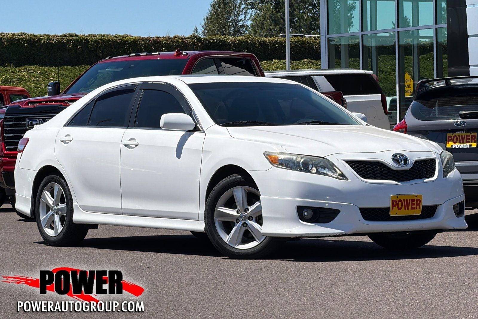 2011 Toyota Camry SE in Super White — front three-quarter view