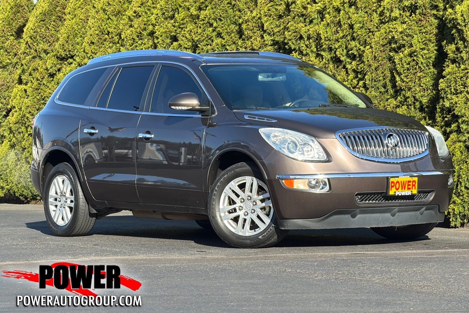 2012 Buick Enclave Convenience Group in Cocoa Metallic — front three-quarter view