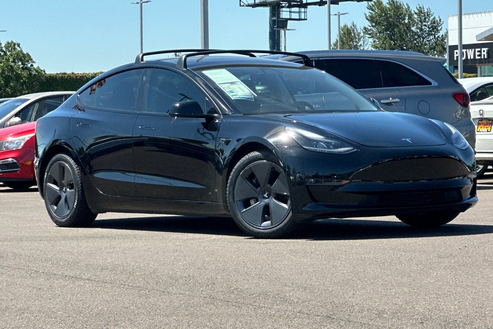 2021 Tesla Model 3 — side profile view