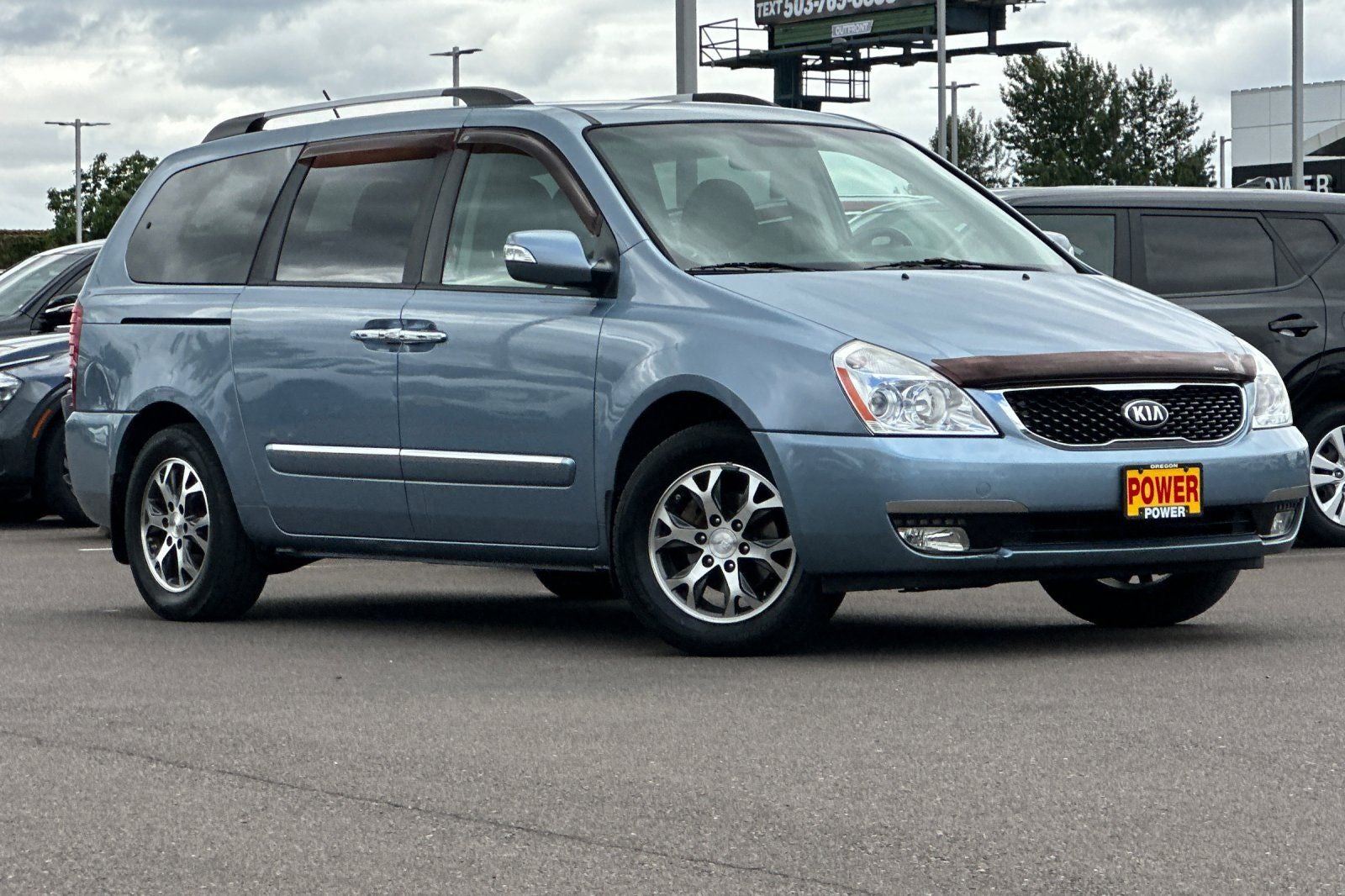 2014 Kia Sedona — side profile view