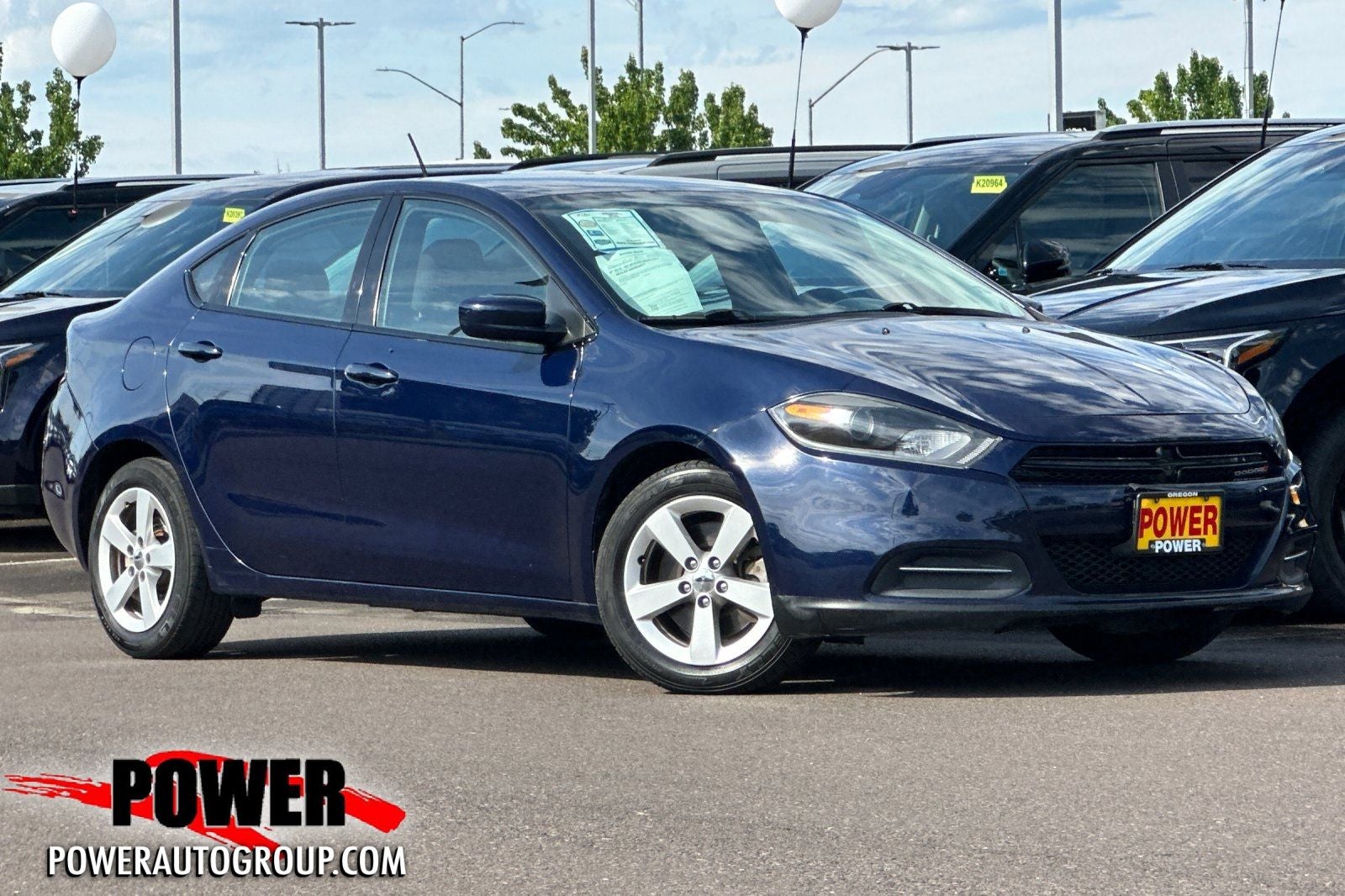 2016 Dodge Dart SXT in True Blue Pearlcoat — front three-quarter view