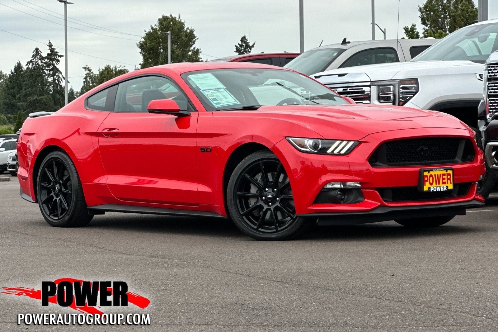 2016 Ford Mustang GT Premium in Race Red — front three-quarter view