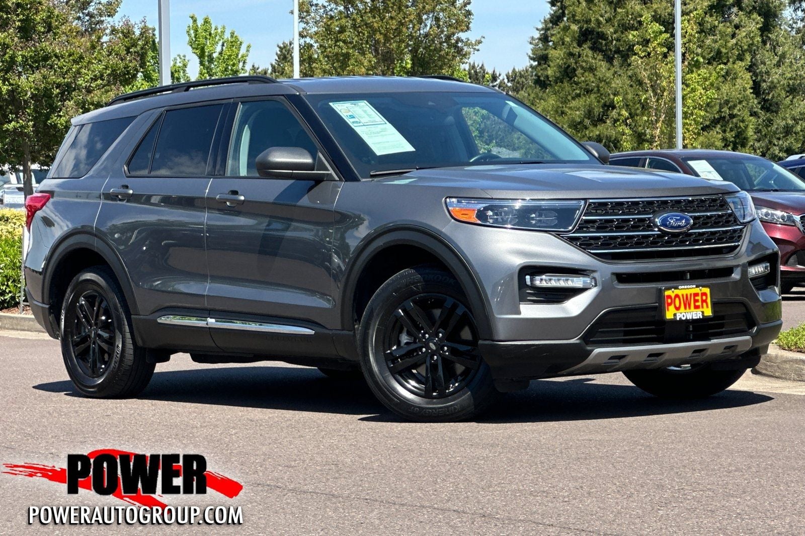2023 Ford Explorer XLT in Carbonized Gray Metallic — front three-quarter view
