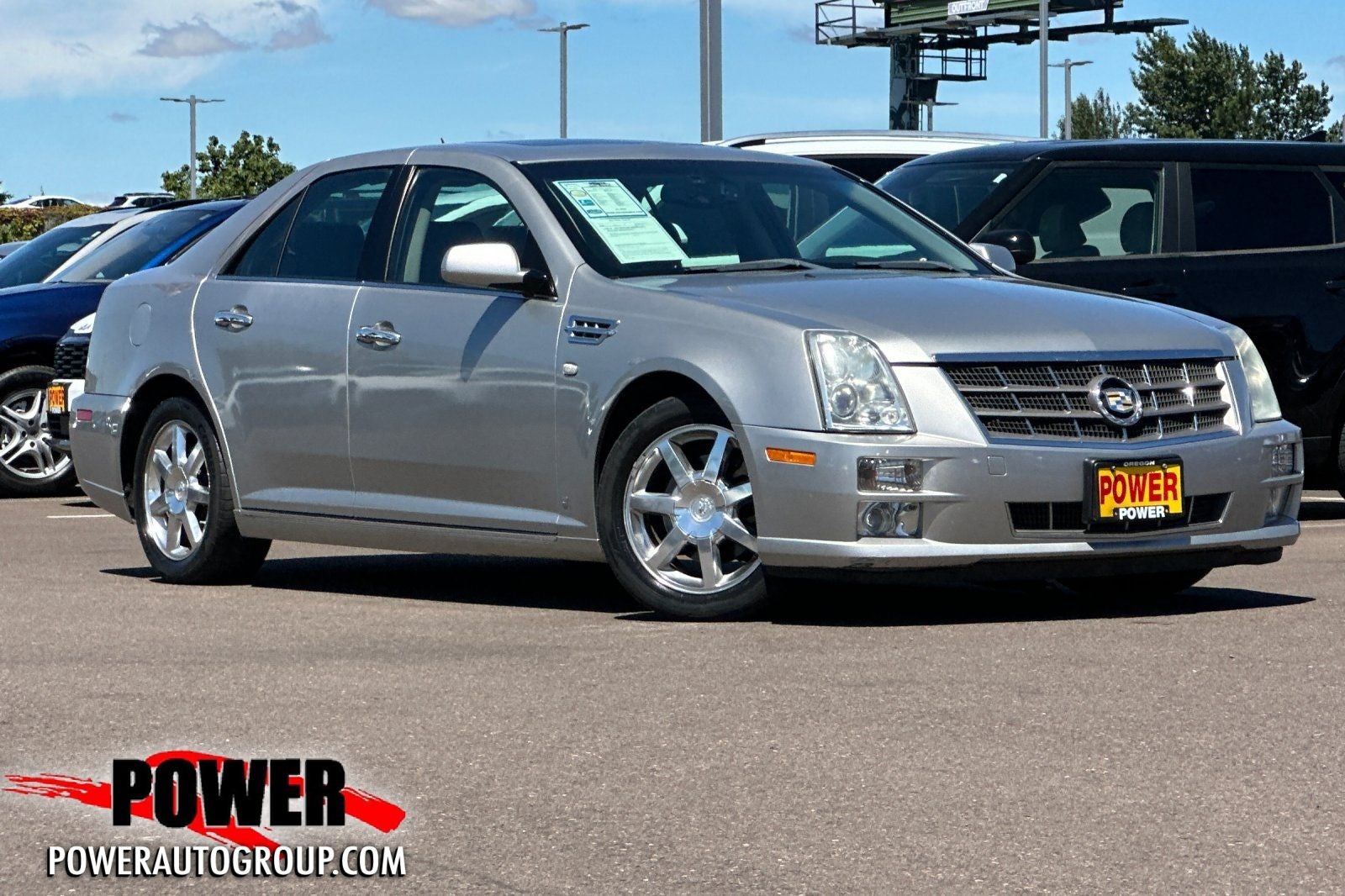 2008 Cadillac STS V6 in Light Platinum — front three-quarter view