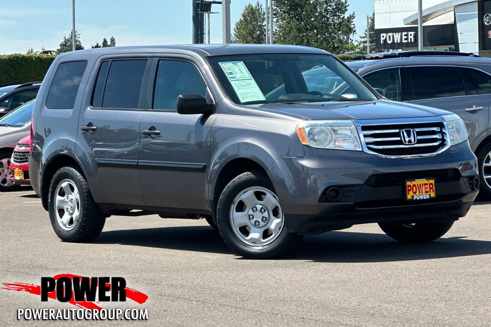 2014 Honda Pilot LX in Modern Steel Metallic — front three-quarter view