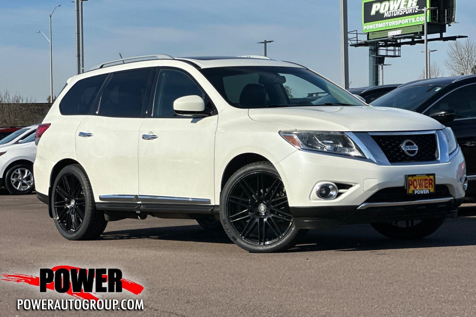 2015 Nissan Pathfinder Platinum in Pearl White — front three-quarter view