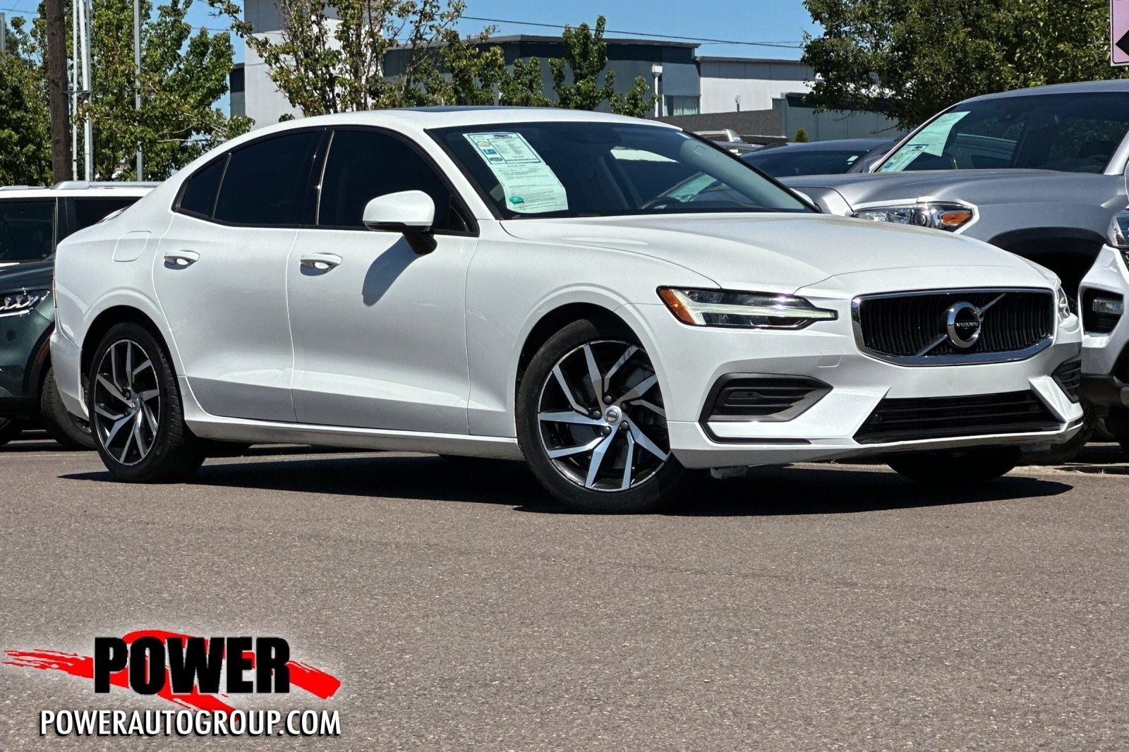2019 Volvo S60 T6 Momentum in Crystal White Pearl — front three-quarter view