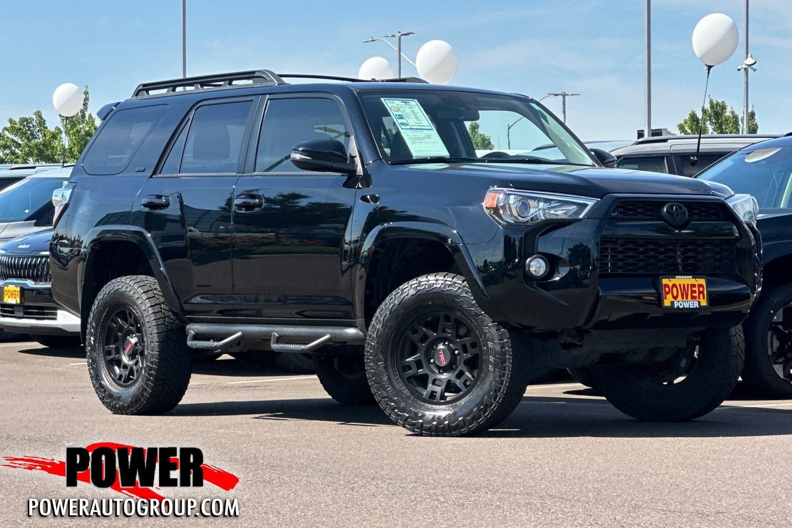 2019 Toyota 4Runner SR5 Premium in Midnight Black Metallic — front three-quarter view