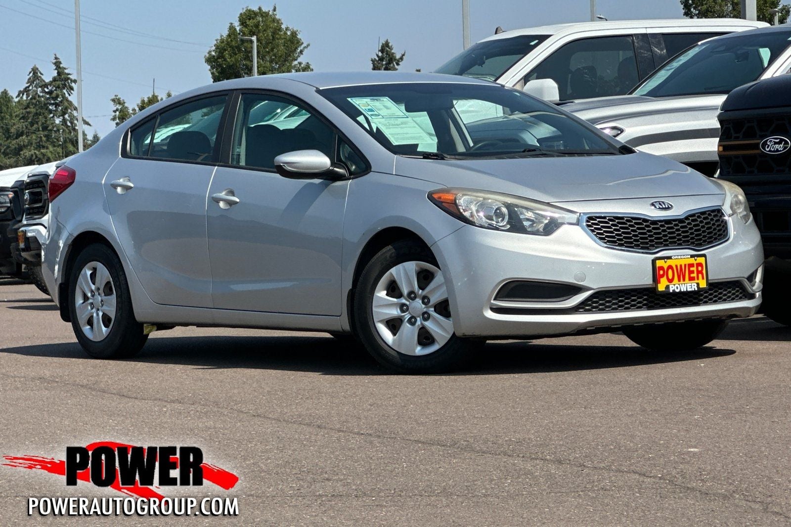 2016 Kia Forte LX in Silky Silver — front three-quarter view