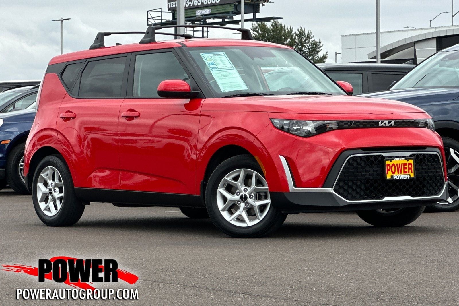 2024 Kia Soul LX in Inferno Red — front three-quarter view
