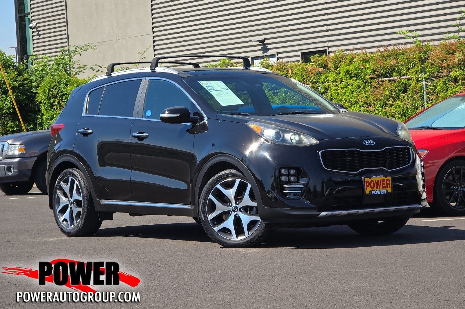 2017 Kia Sportage SX in Black Cherry — front three-quarter view