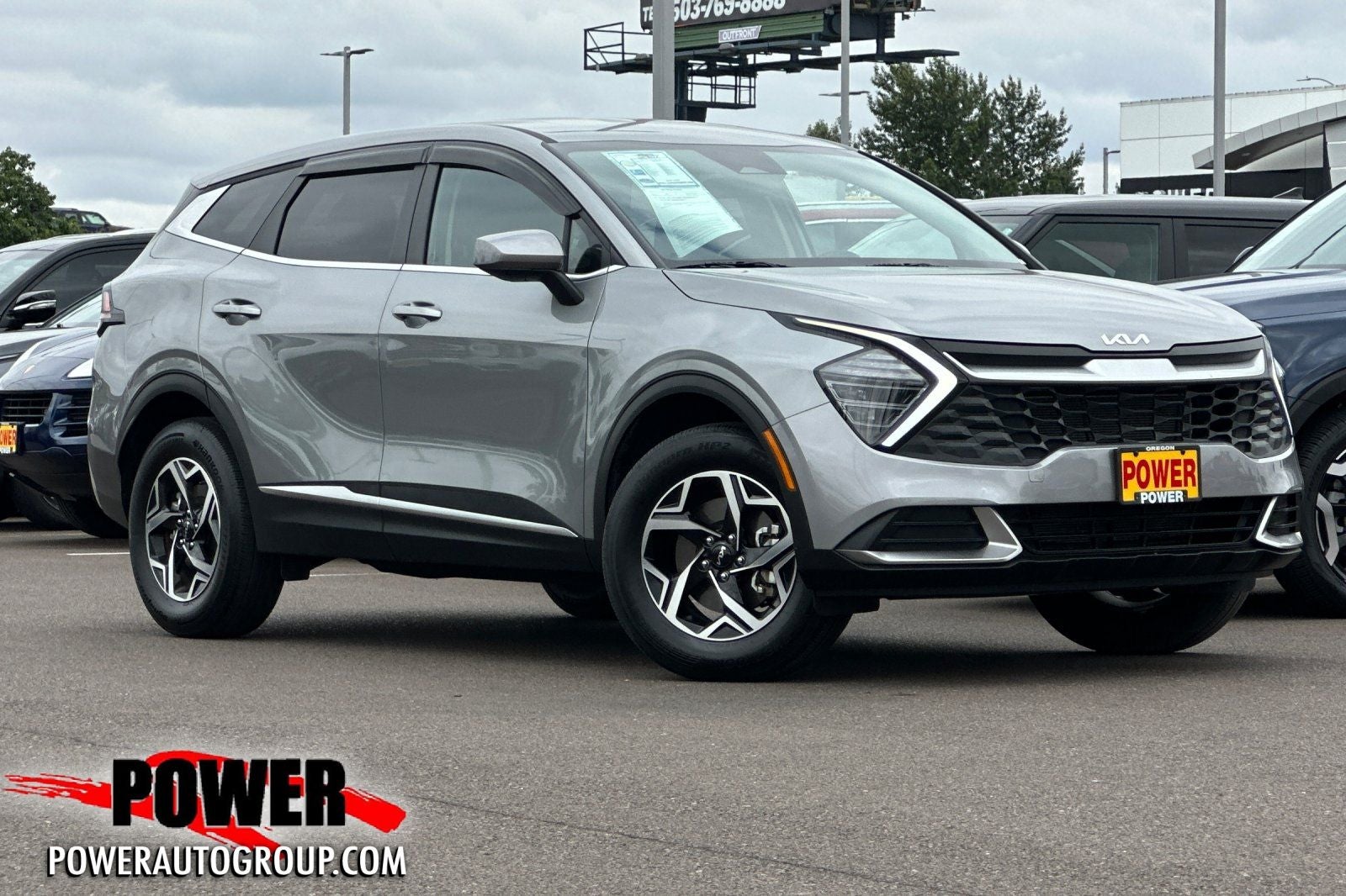 2025 Kia Sportage LX in Steel Gray — front three-quarter view